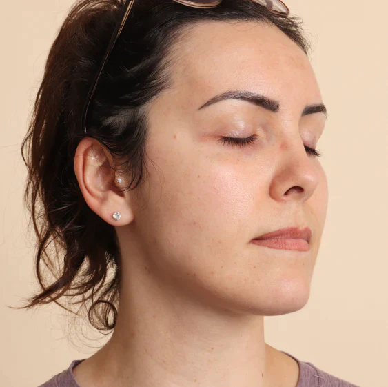 Image of woman preparing for lip blushing removal.