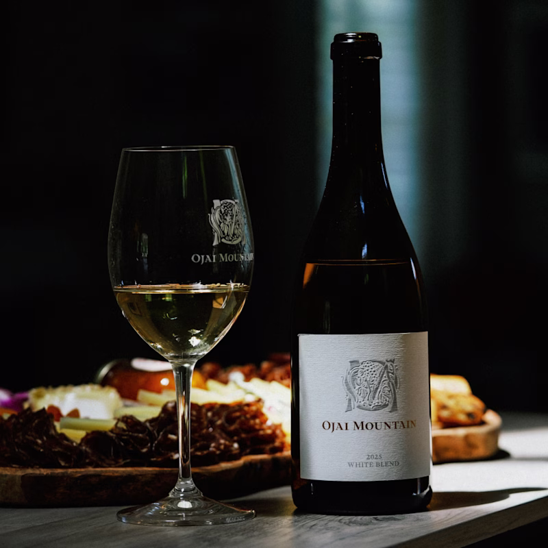 Estate White in the Glass, Backlit Close-up of white wine in an engraved Ojai Mountain glass, backlit in golden light
