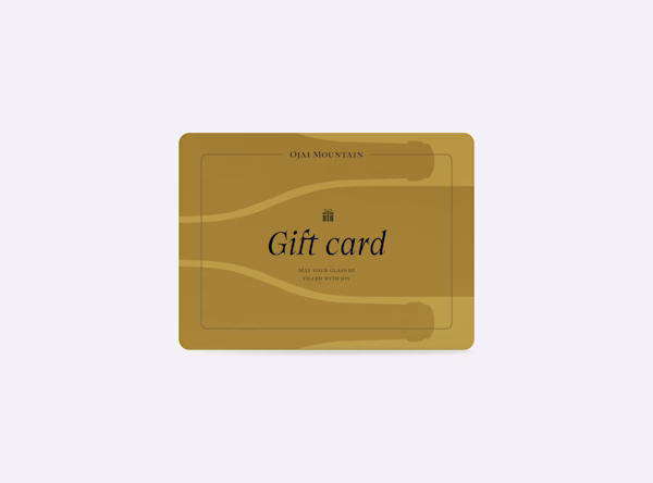 Ojai Mountain $500 wine gift card in gold with flowing line details and "Gift card" in dark script