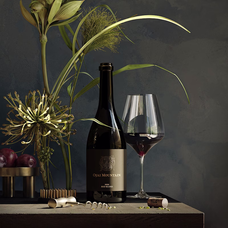 Ojai Mountain 2020 Red Blend styled with dried flowers and a poured glass