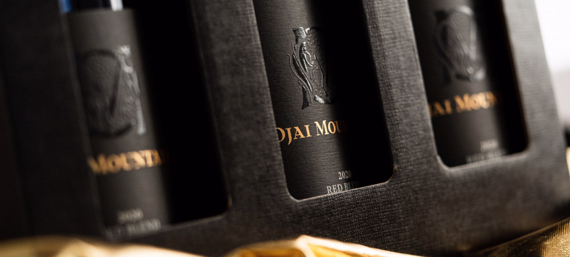 Ojai Mountain bottles seated in the estate presentation box