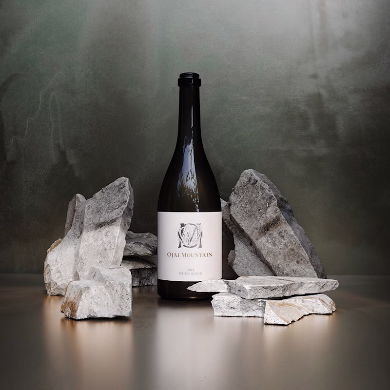 Ojai Mountain 2021 White Blend bottle set among pale stacked rocks Ojai Mountain 2021 White Blend bottle set among pale stacked rocks