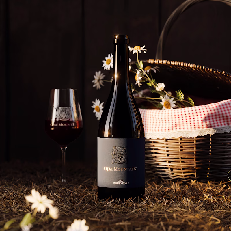 2023 Mourvèdre Gallery Image 01 Ojai Mountain 2023 Mourvèdre with a picnic basket and white daisies