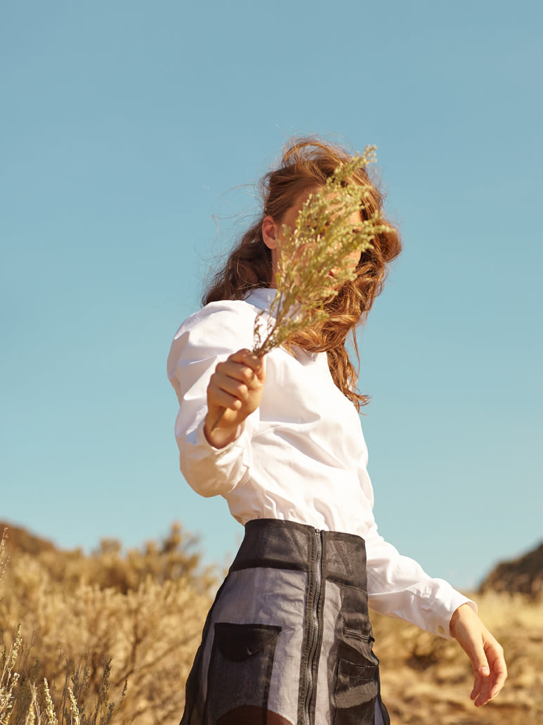 Woman holding sage grass