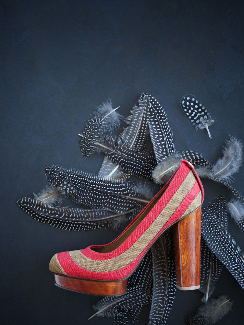 Red shoe with feathers