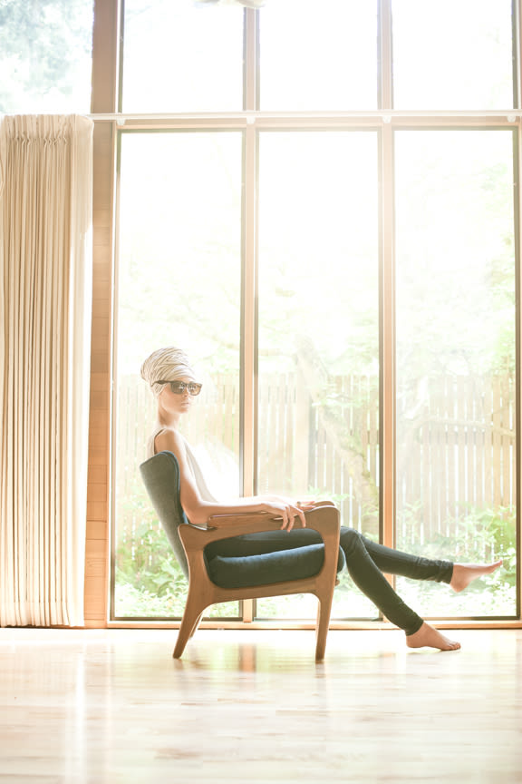 Woman sitting in chair