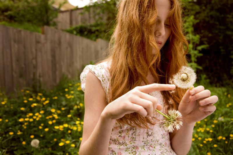 Woman with dandelion