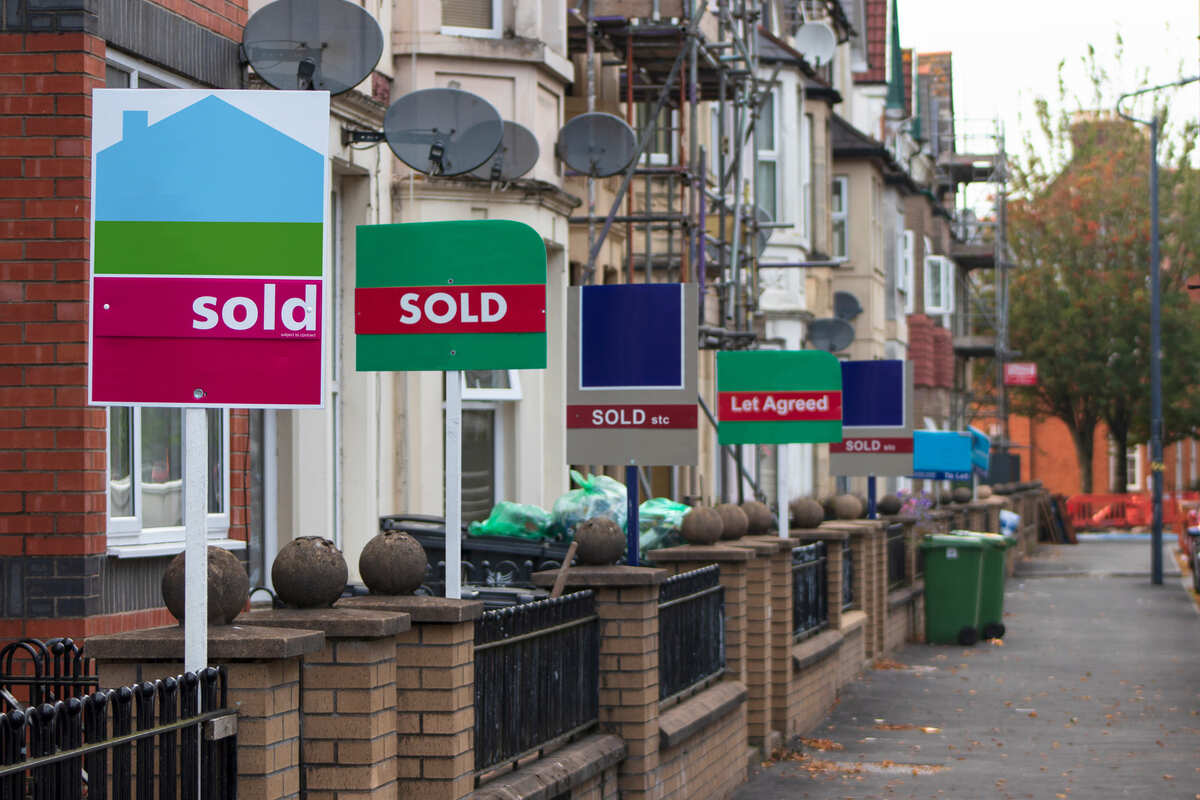 A row of sold signs