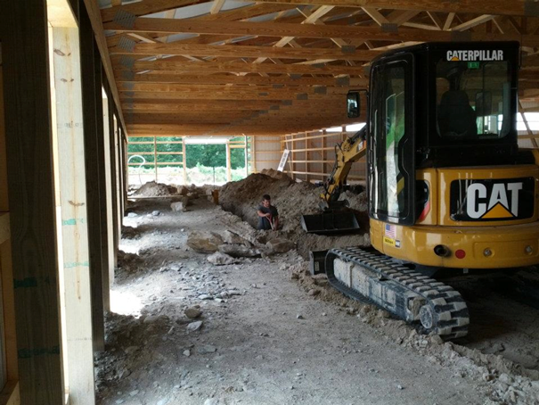 building indoor arena digging into soil
