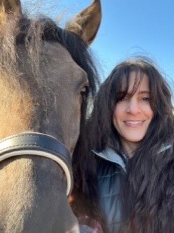Head shot of Gina Fitch and her horse Two Socks
