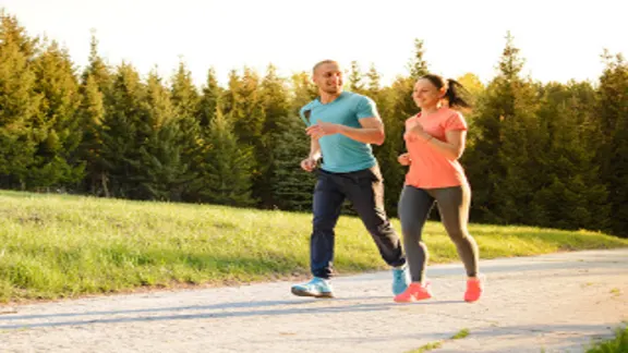 Couple running in park