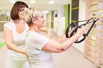  Woman using bands for physical therapy