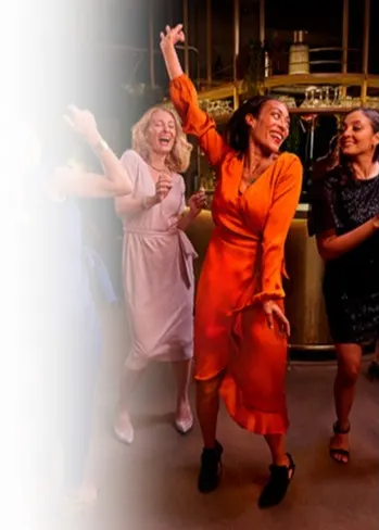 Women dancing in a bar
