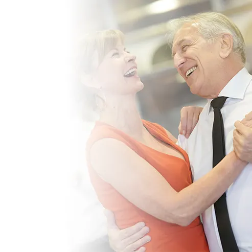 An elderly man and women dancing without feeling body