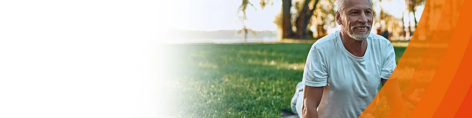 an elderly couple on yoga mats outside stretching their