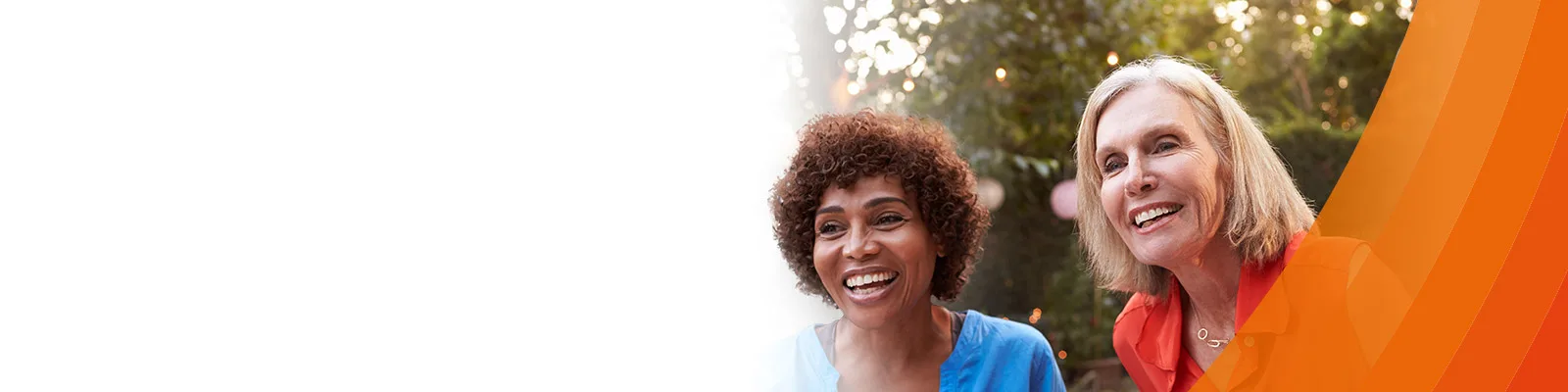  three women smiling outside