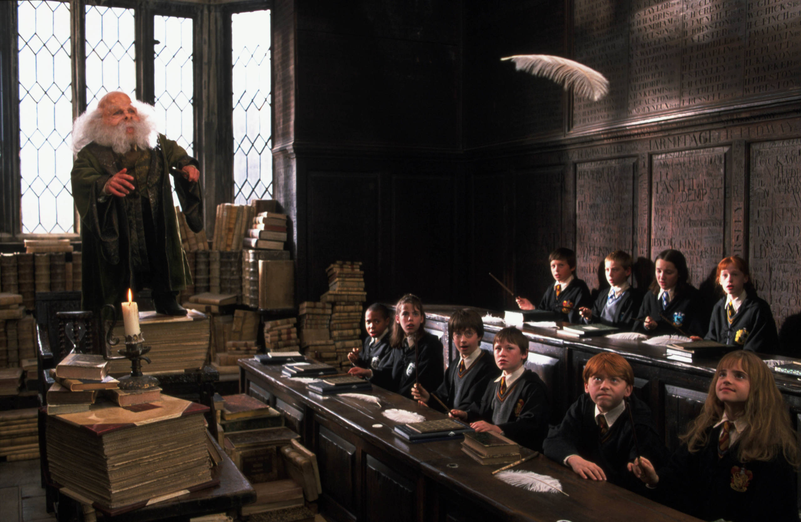 Flitwick teaches his first year Charms class Wingardium Leviosa