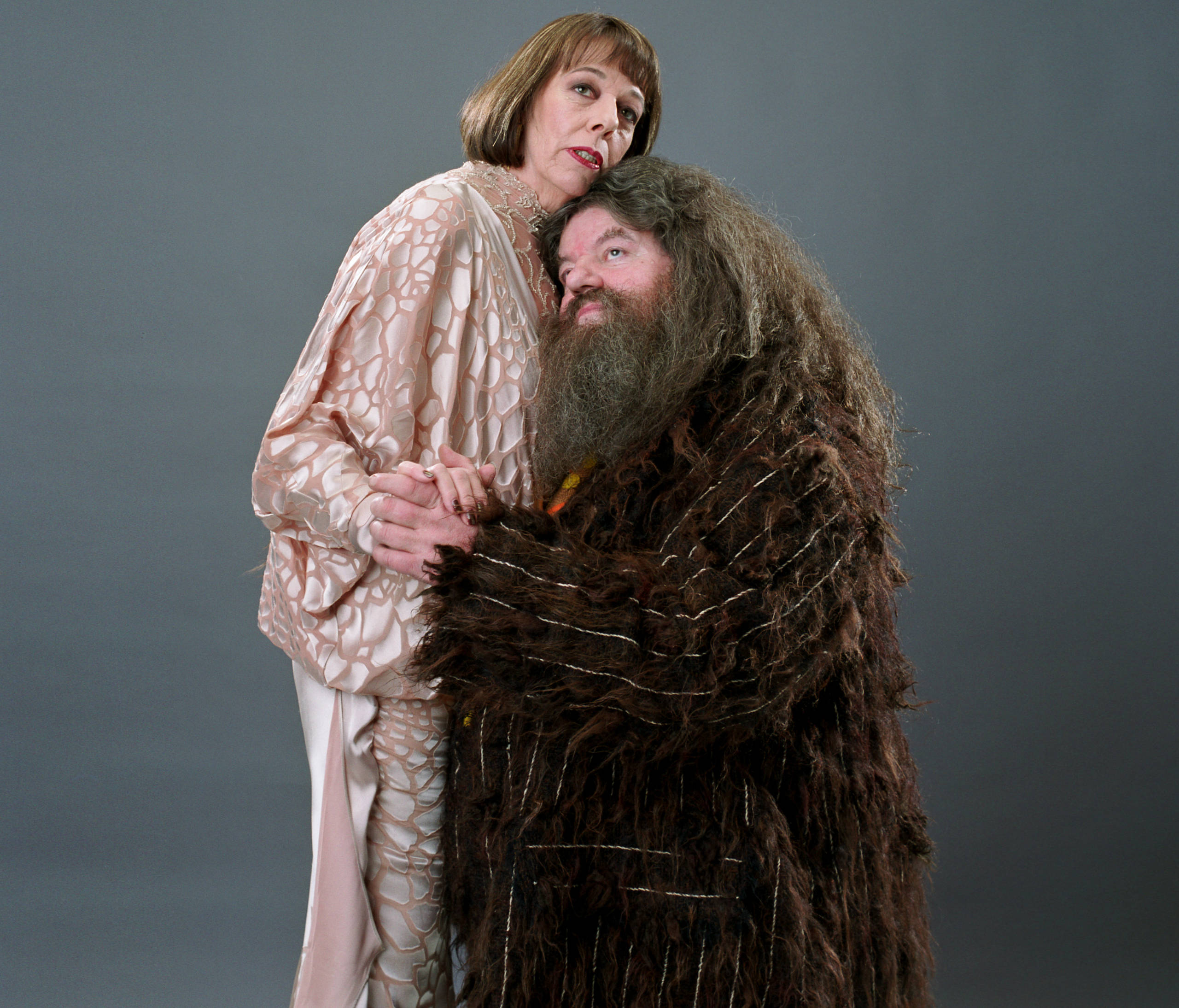 Hagrid and Madame Maxime slow dance together.