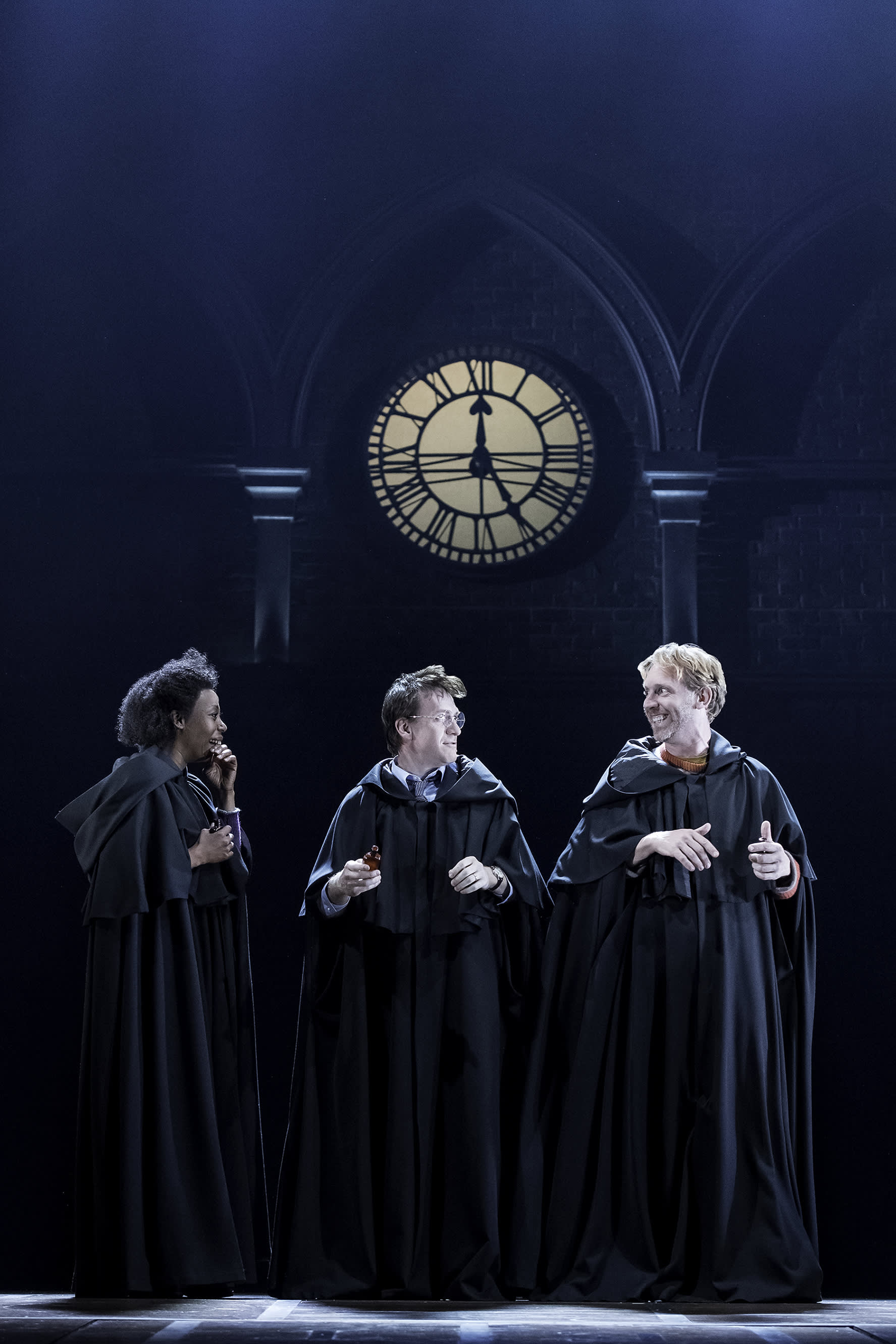 Hermione, Harry and Ron wearing robes, from Harry Potter and the Cursed Child