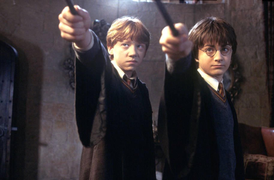 Harry and Ron with raised wands 