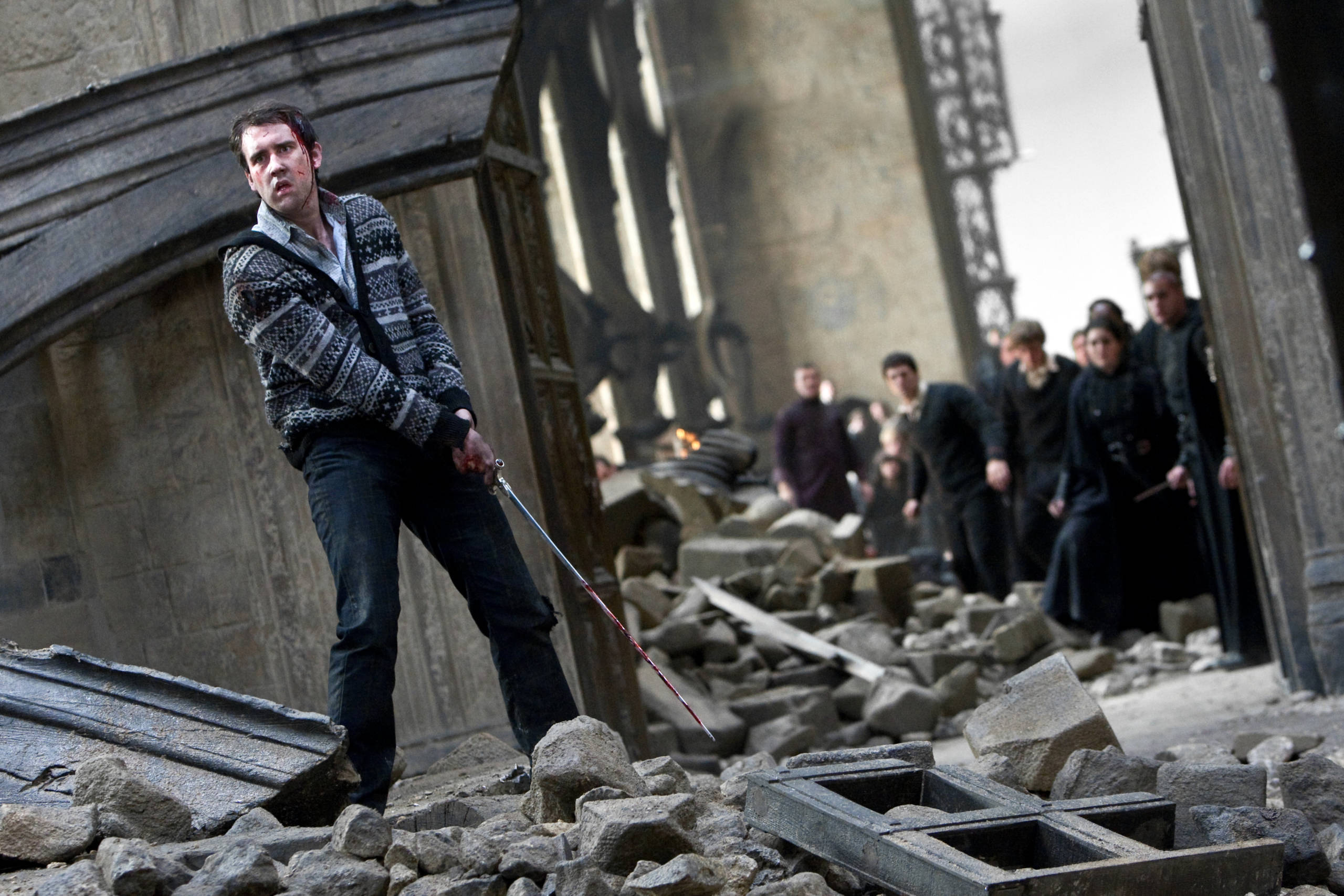 Neville defies Lord Voldemort and holds the sword of Gryffindor in the aftermath of the Battle at Hogwarts.
