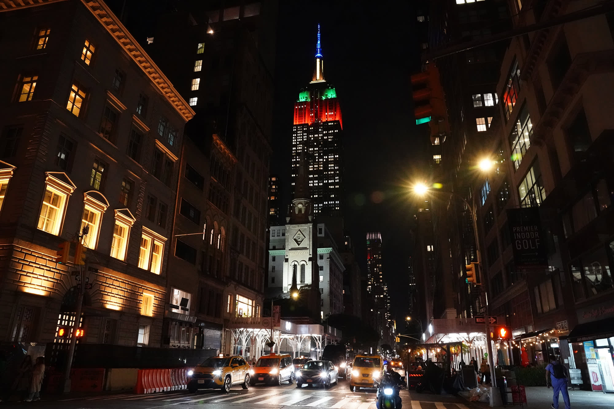 The Empire State Building lit up in the four Hogwarts house colours.