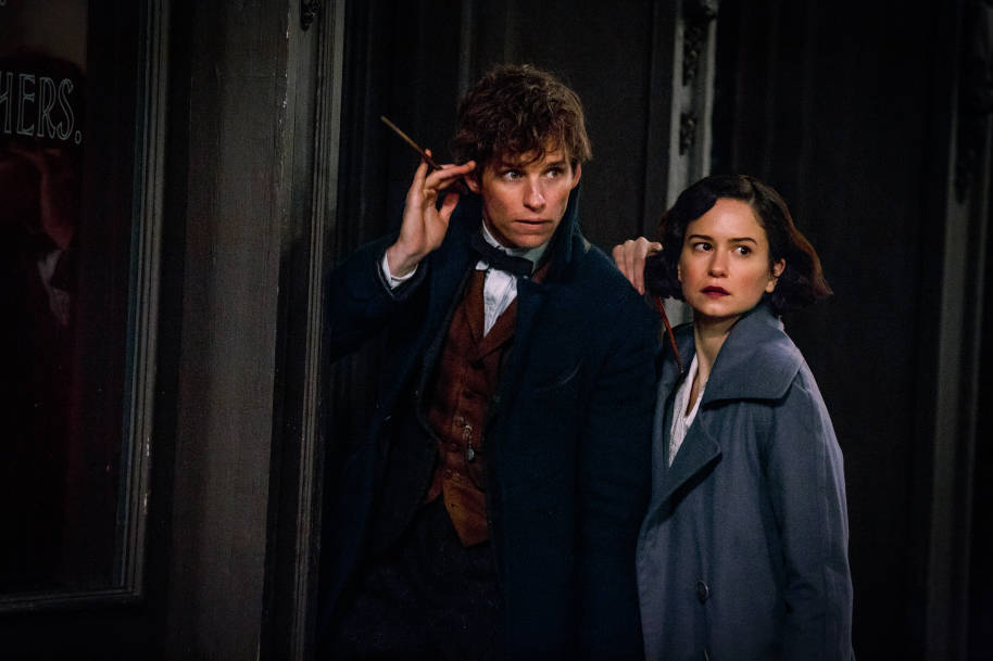 Newt and Tina outside, with their wands drawn