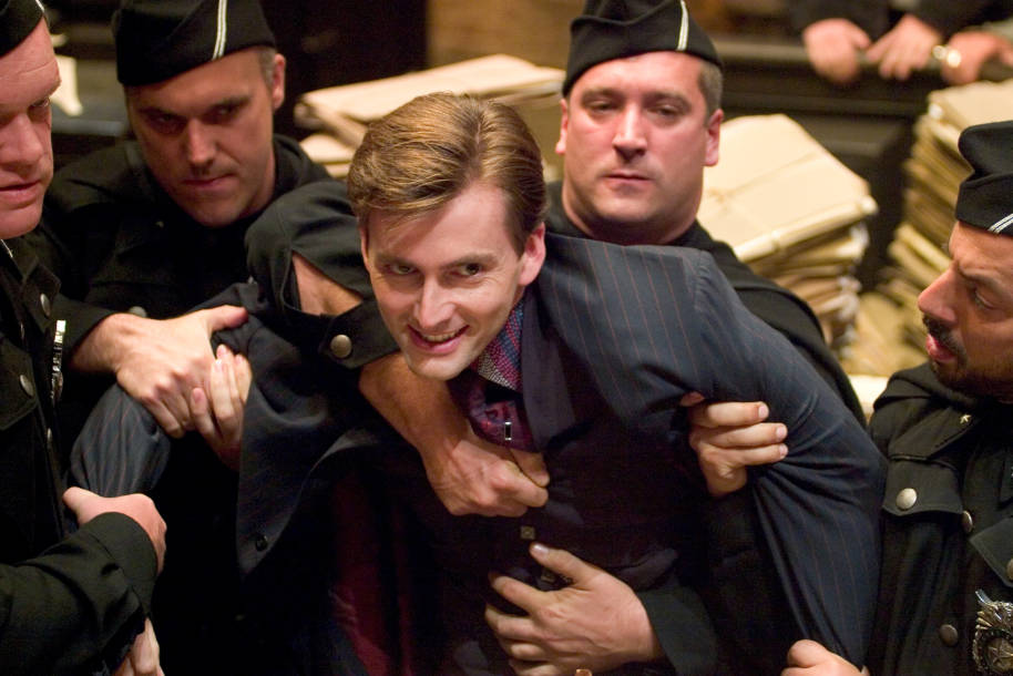 Barty Crouch is apprehended by officials at the Wizengamot.