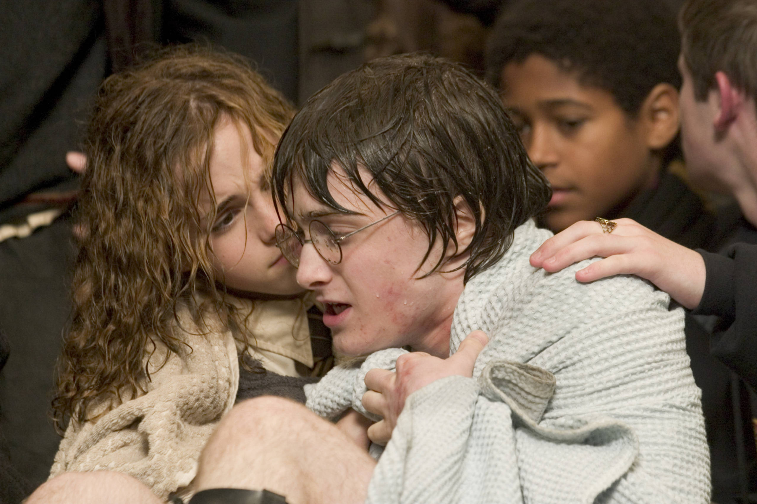Hermione wrapping Harry in a towel after task 2 
