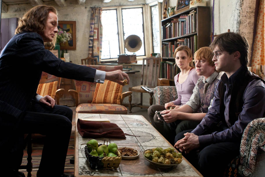 Scrimgeour dicusses Albus Dumbledore's will with Harry, Ron and Hermione at The Burrow