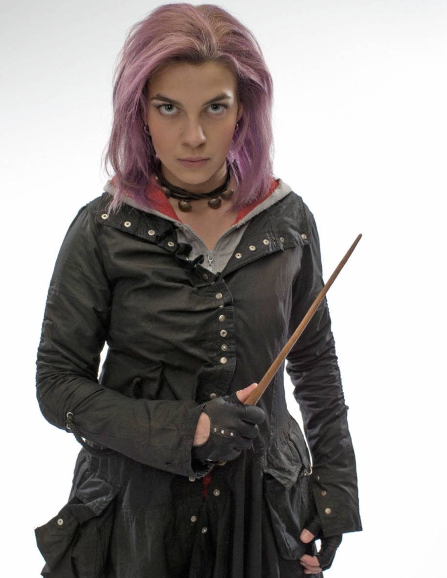Tonks with pink hair and her wand from the Order of the Pheonix 