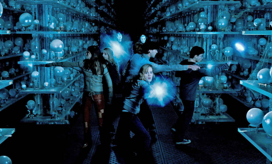 Hermione leads the attack in the Hall of Prophecy.
