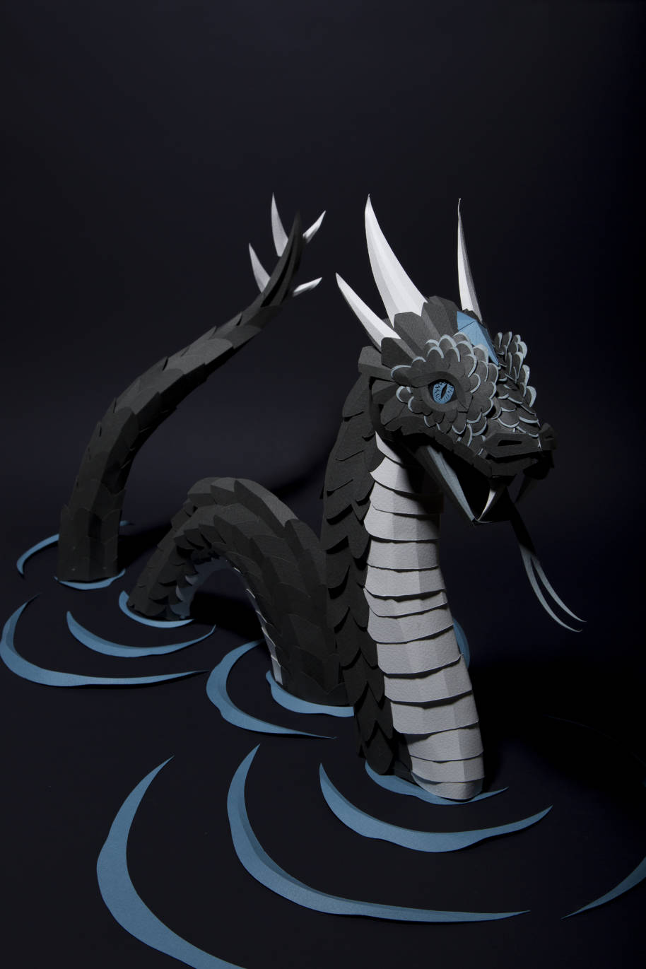 Photograph of a paper model of a Horned Serpent, by artist Andy Singleton