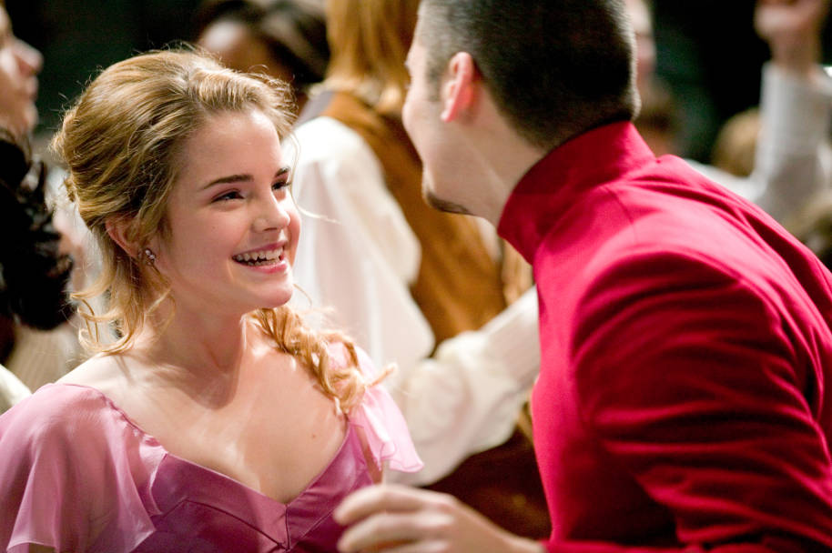 Hermione and Krum dancing at the Yule Ball. Hermione is looking up at Krum and smiling.