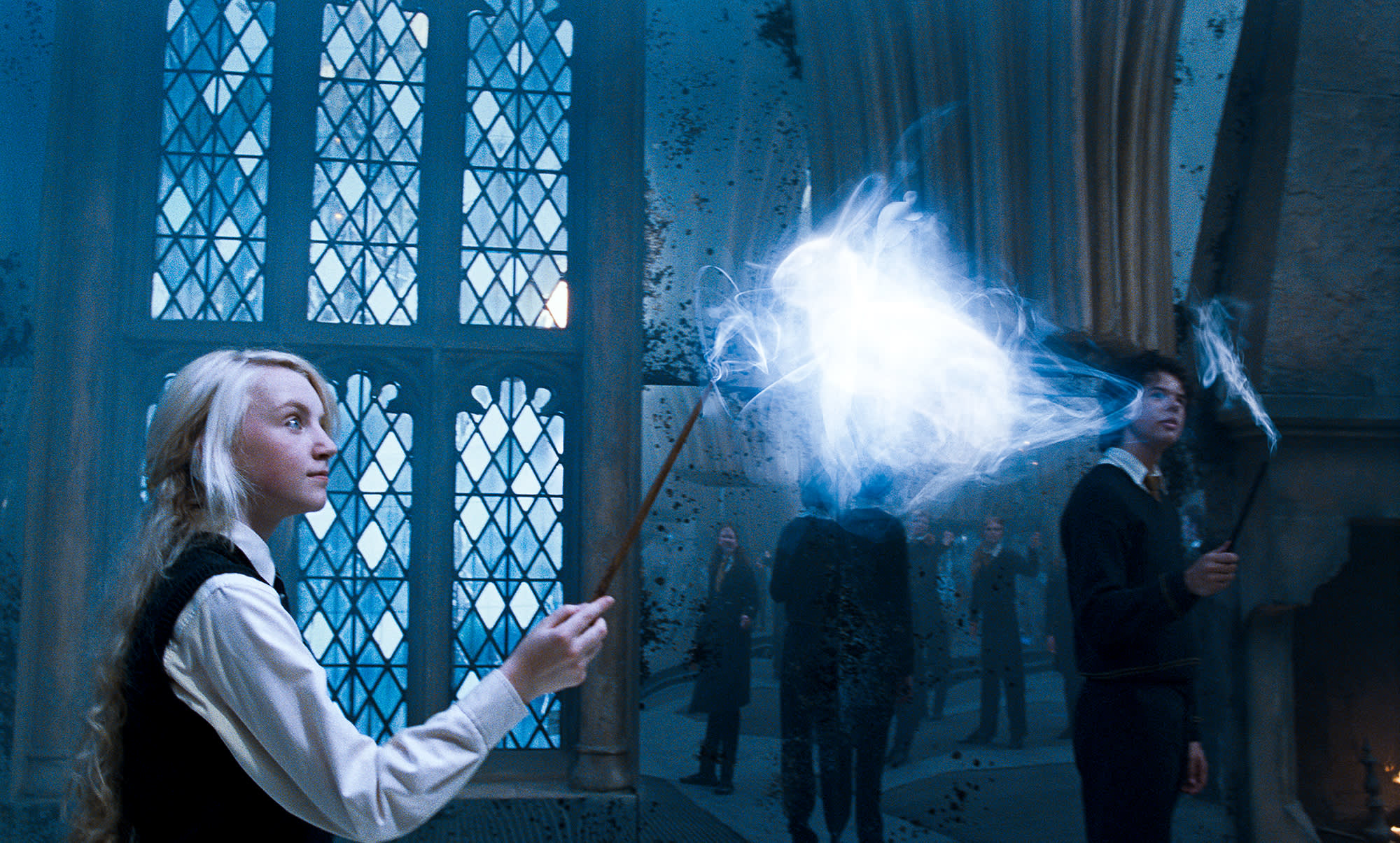 Luna casting a Patronus in the Room of Requirement