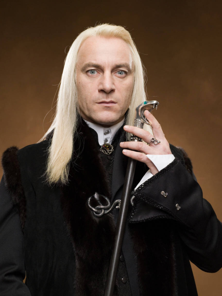 Lucius looks intimidating holding his cane from the Chamber of Secrets 