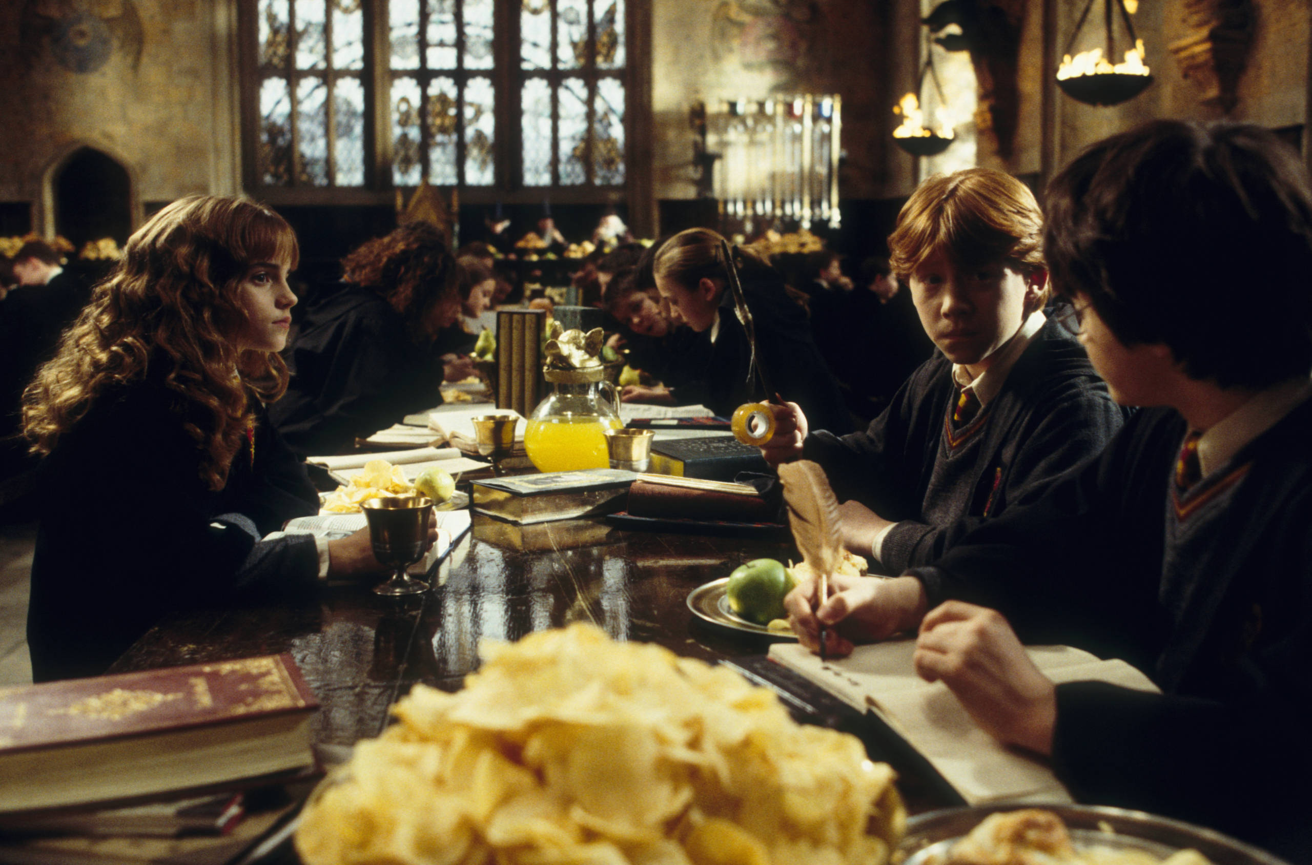 RonWeasley WB F2 RonWeasleyAtBreakfastWithHermioneGrangerAndHarryPotter Still 100615 Land