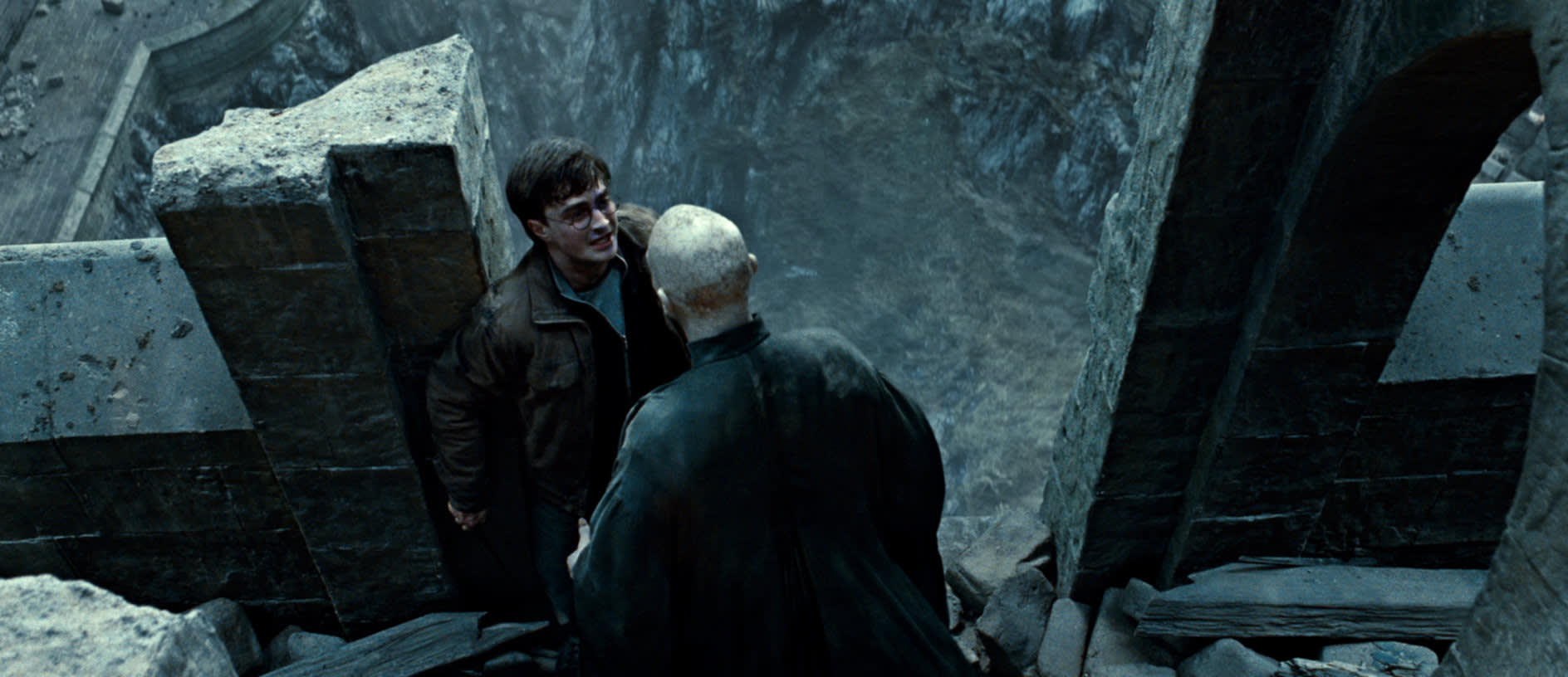 Voldemort and Harry at the edge of tallest tower in Hogwarts from the Deathly Hallows Part 2 