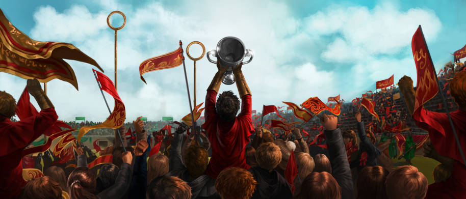 Harry holds up the Qudditch Cup