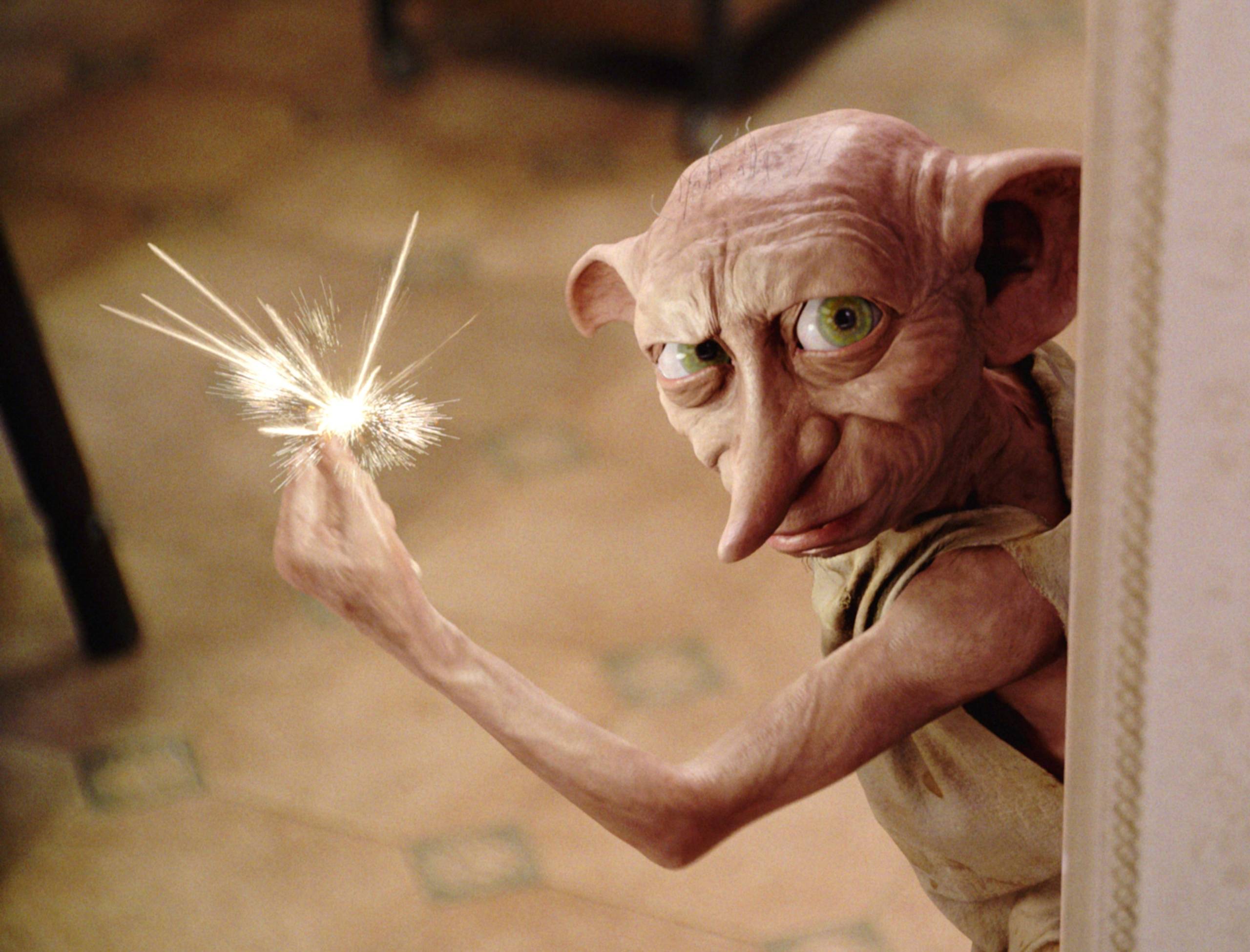 Dobby clicking his fingers to cast a spell 