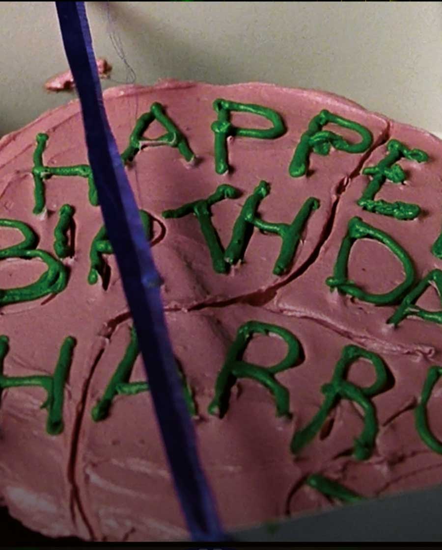 hp-f1-harry-cake-hagrid-happee-birthdae-close-up-app-article-hero