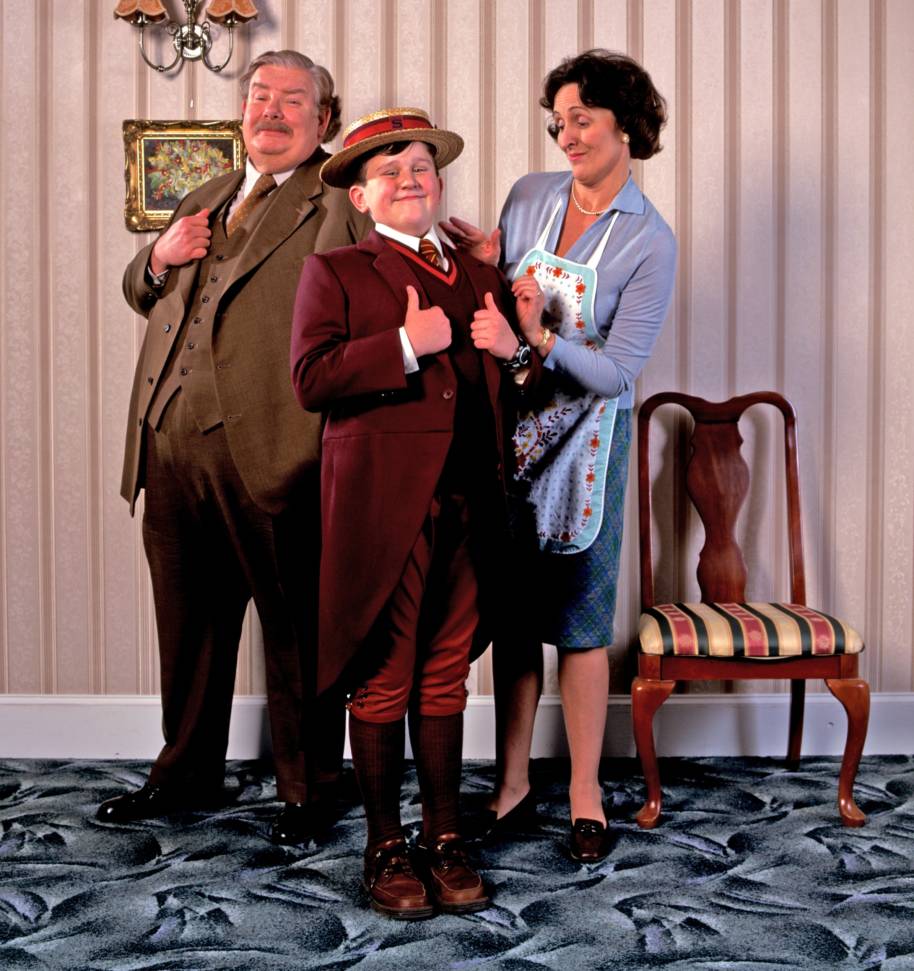 The Dursley family photo, Dudley is wearing his Smeltings school uniform