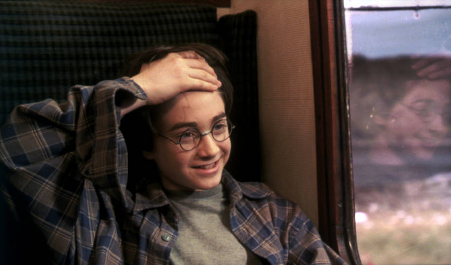 Harry showing his scar to Ron on the Hogwarts Express 