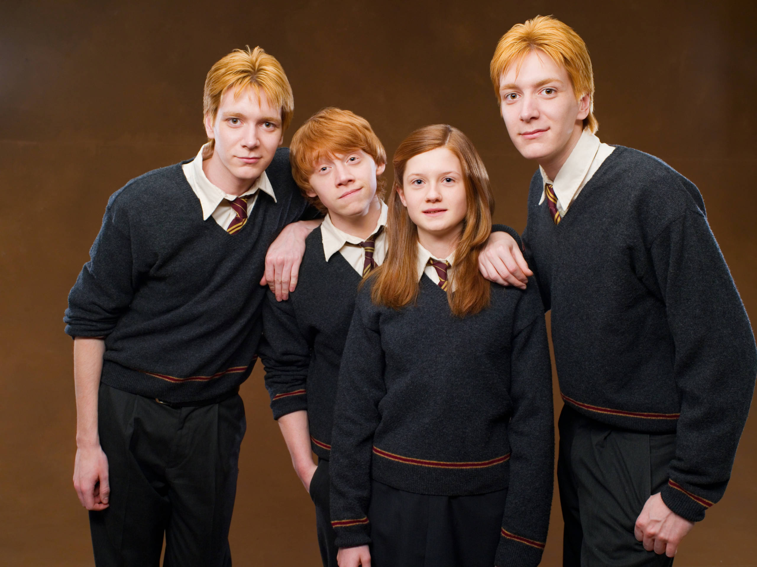 The Weasley's in school uniform 