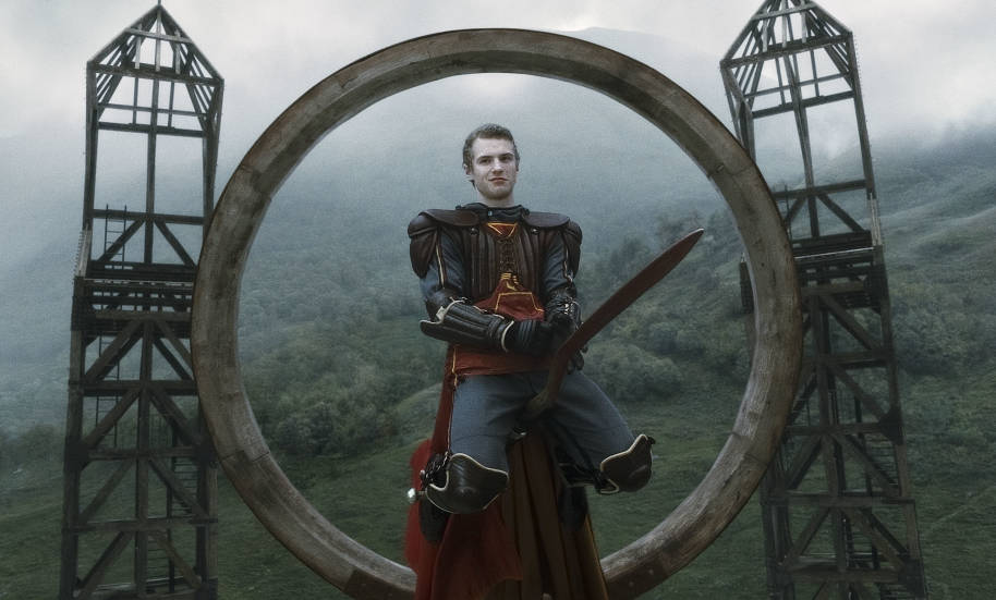 Cormac McLaggen looking smug at the Quidditch goalpost