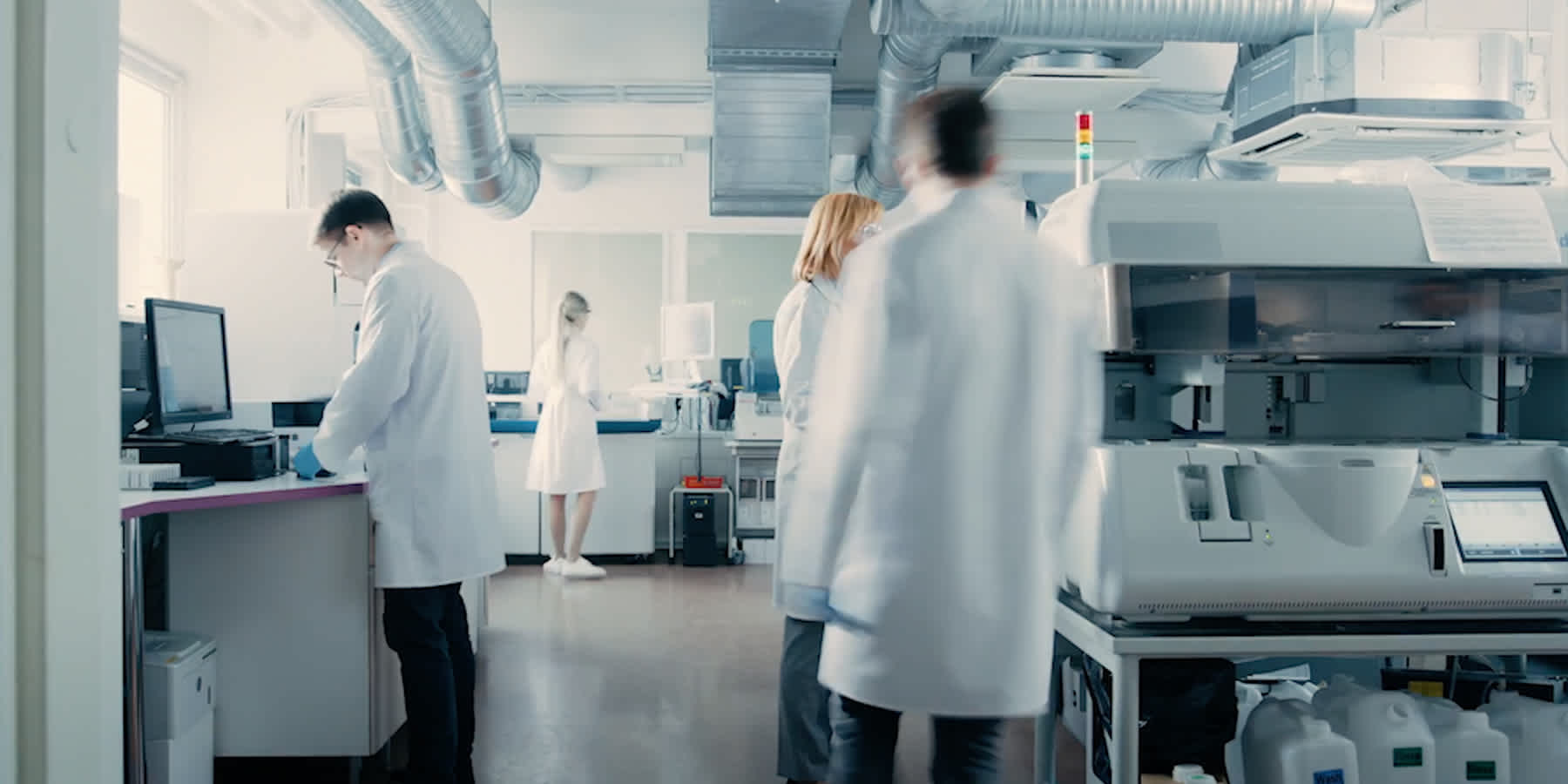 People in a lab carrying out scientific research