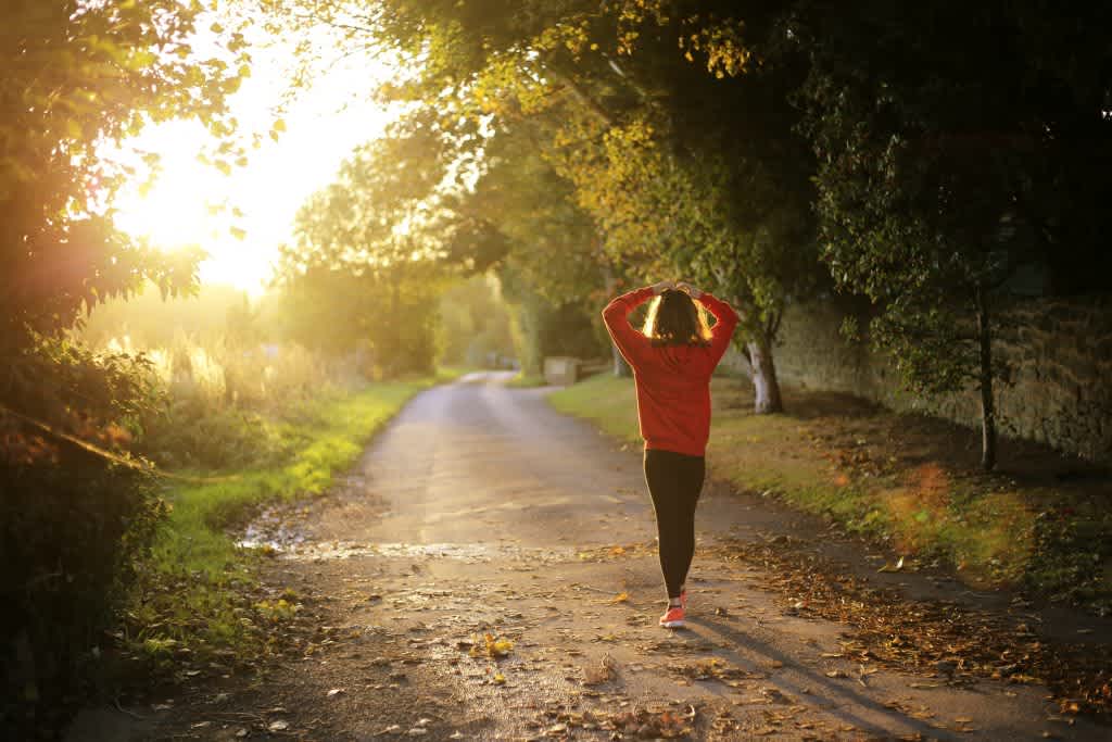 Woman going on regular morning jog to lose weight without dieting