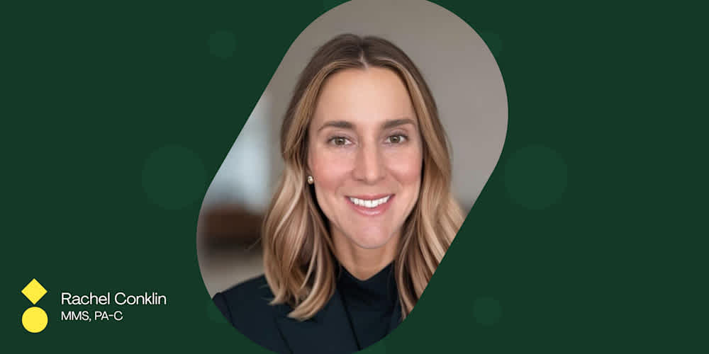 rachel headshot on dark green background