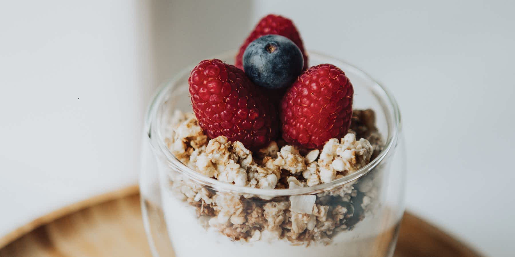Glass filled with yogurt that has probiotics for health