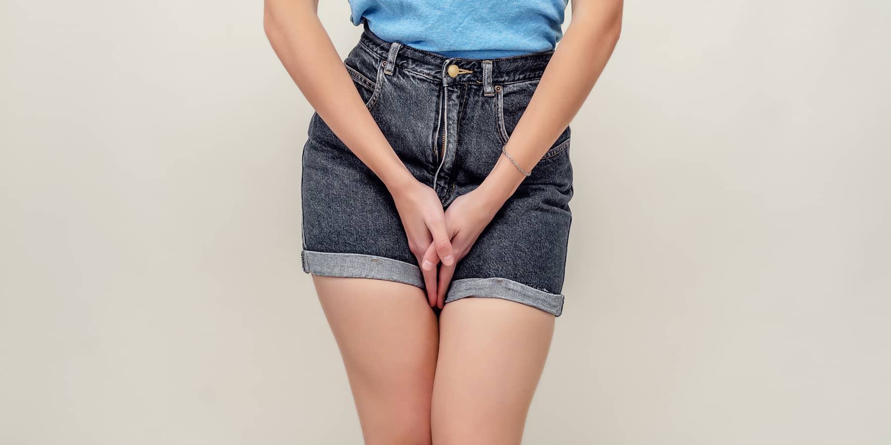 Woman experiencing genital discomfort in need of Mgen treatment